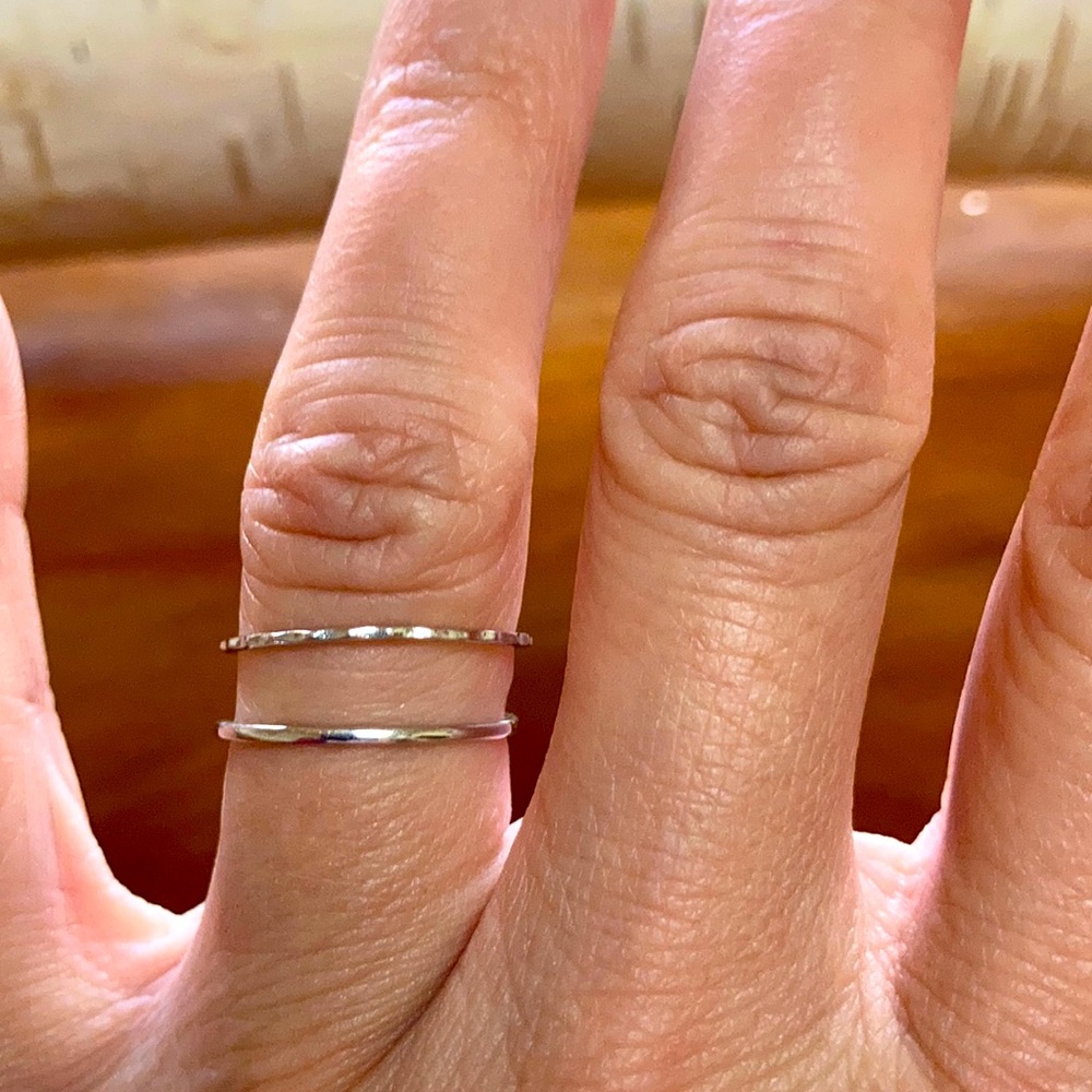 Stackable stamped 14k white gold rings.